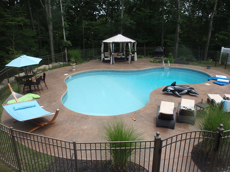 Swimming pool and stamped concrete project example 27